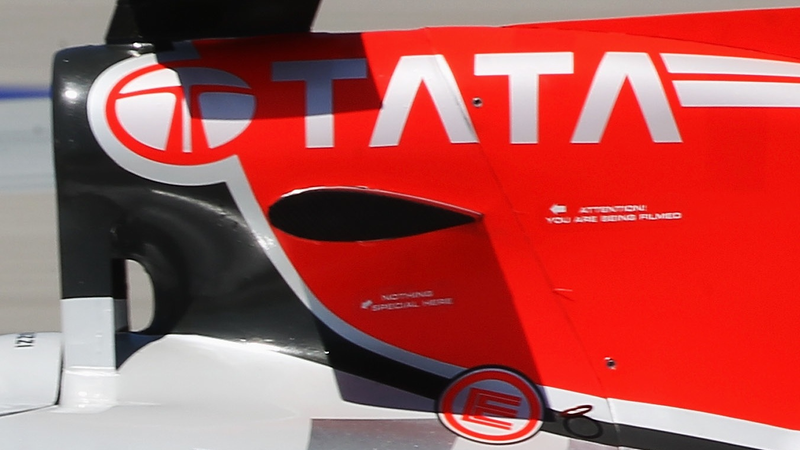 Illustration for article titled This sponsor-less F1 car is plastered with fake ads